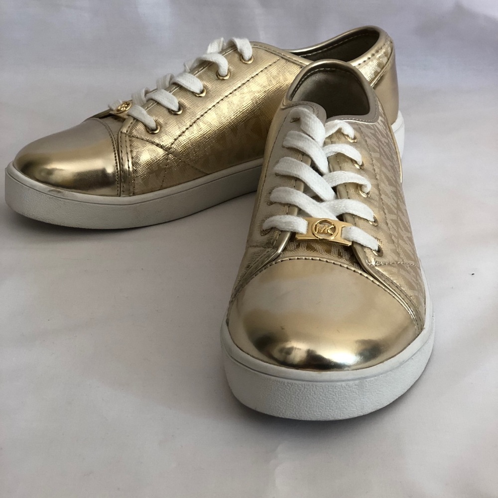 Michael Kors gold lace up sneakers size 4